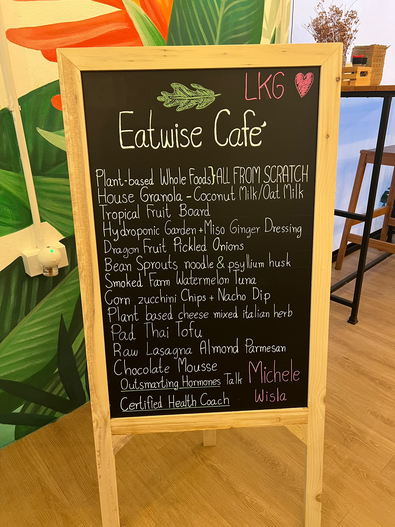 Chalkboard menu for a plant-based event tasting at EatWise Café